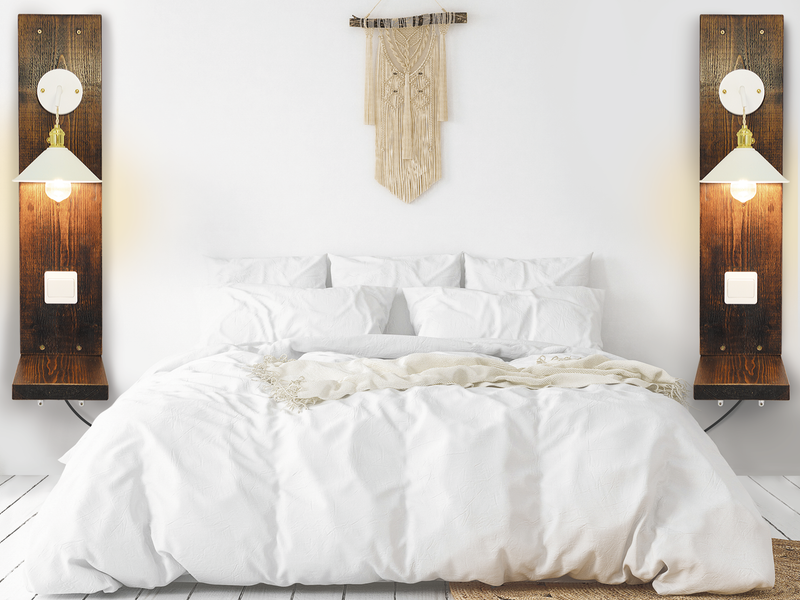 Scandi wooden bedside table with modern white lampshades.