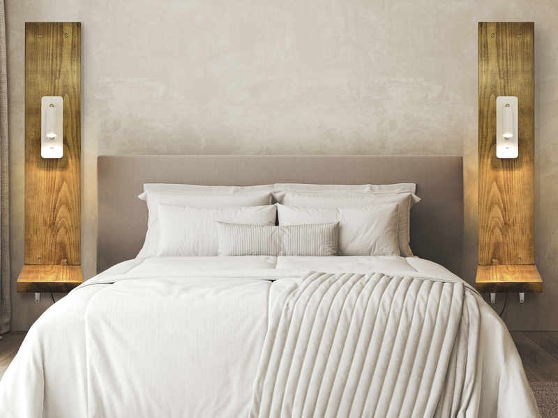 reading lights for bed on a wooden, floating bedside table.