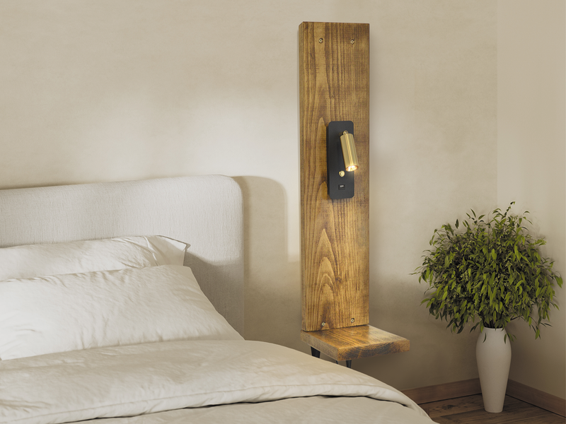 slim bedside table for small bedrooms, featuring a gold reading light.